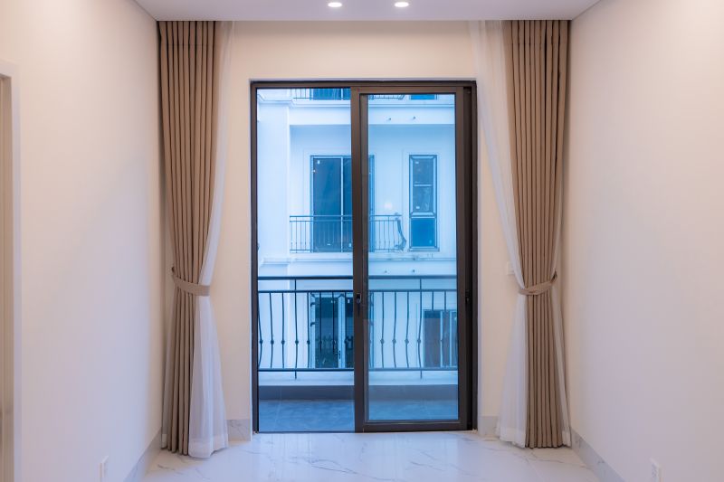 Sliding glass patio door opening to a balcony